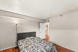 Bedroom with wood finished  floor