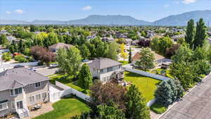 Aerial view of residential area featuring mountains