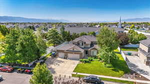 Aerial view of residential area featuring mountains