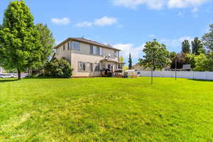 Back of property with stucco siding