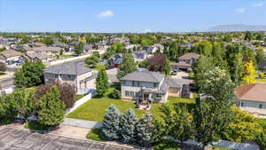 Aerial view of residential area featuring a mountain backdrop