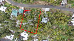 Aerial view of property's location featuring property parcel outlined