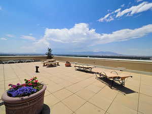 View of patio with a mountain view