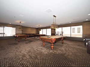 Recreation room with billiards and carpet