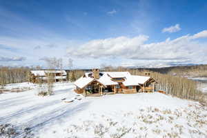 Back of property featuring a chimney