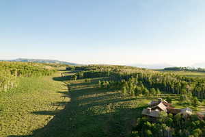 View of yard with a mountain view and a view of countryside