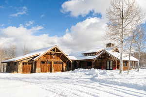 View of front of property with stone siding
