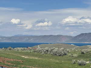 View of mountain background featuring a large body of water