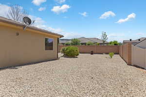 View of fenced backyard