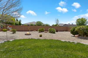 View of yard featuring a fire pit