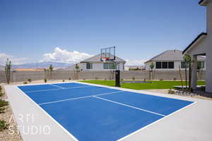 View of sport court featuring basketball court and a mountain view