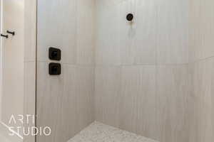 Bathroom with a tile shower