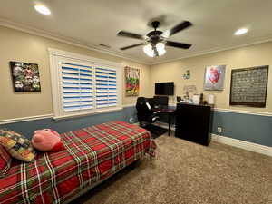 Bedroom featuring carpet flooring, ornamental molding, a desk, recessed lighting, and ceiling fan