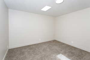 2nd bedroom with beautiful skylight
