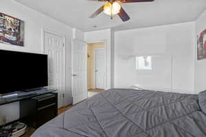 Bedroom featuring carpet floors and a ceiling fan