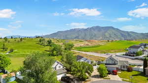 Mountain view with nearby suburban area and a local golf course