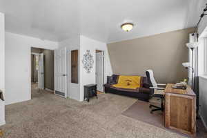 Office area with carpet and baseboards