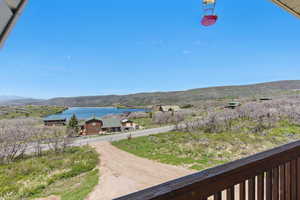 Mountain view featuring a nearby body of water