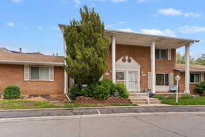 View of front of home with brick siding
