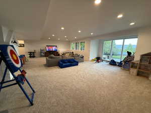 Recreation room featuring recessed lighting and carpet