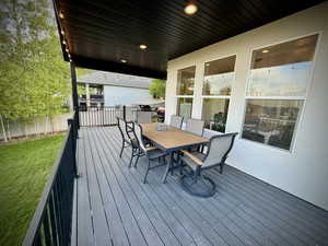 Wooden terrace with outdoor dining space