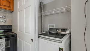 Washroom featuring washer / clothes dryer