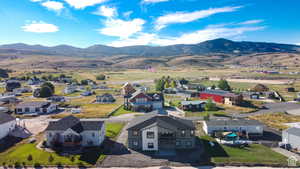 Aerial view of residential area with a mountain backdrop