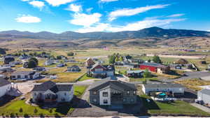 Aerial view of residential area featuring mountains