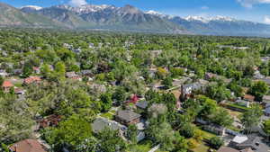 Aerial perspective of suburban area with a mountain backdrop