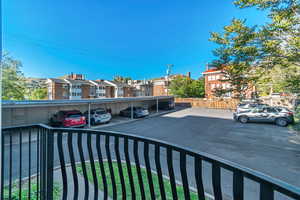 Exterior Juliet balcony with parking with a residential and foothill view