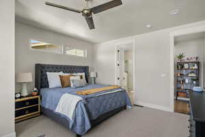 Bedroom with carpet, baseboards, connected bathroom, ceiling fan, and recessed lighting