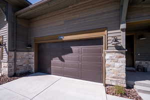 Garage with concrete driveway