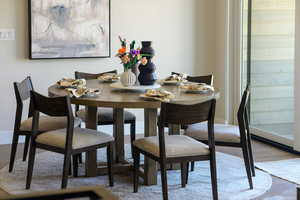 Dining space featuring wood finished floors