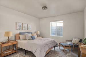 Bedroom with light carpet