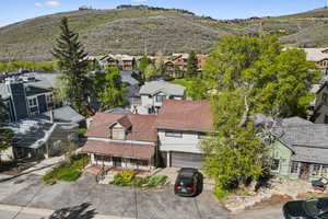 Aerial perspective of suburban area featuring mountains