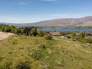 View of mountain backdrop with a nearby body of water