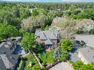 Aerial view of residential area with a heavily wooded area