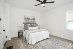 Bedroom with baseboards and ceiling fan