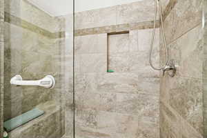 Full bath with tiled shower