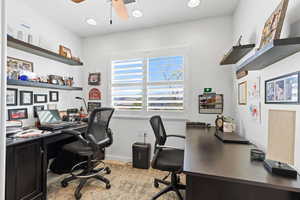 Office space featuring ceiling fan, baseboards, and recessed lighting