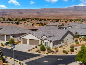Aerial view of residential area with a mountainous background