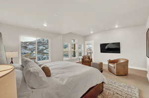 Bedroom featuring recessed lighting, baseboards, and light tile patterned floors