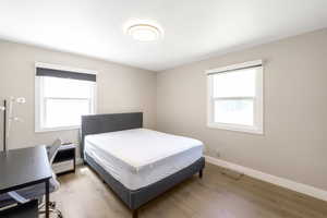 Bedroom #1 includes queen size bed, desk & chair. The entire home has new hardwood floors.