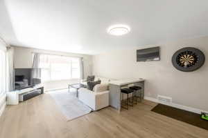 Tons of natural light in the large living room and kitchen. All furniture in the home is included.