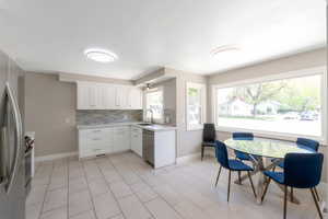 Fantastic windows in kitchen and dining area capture incredible mountain views and usher in plenty of sunlight. Stainless steel appliances.