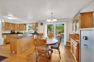Kitchen dining space with door to yard.