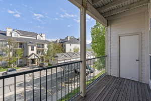 Wooden deck featuring a residential view