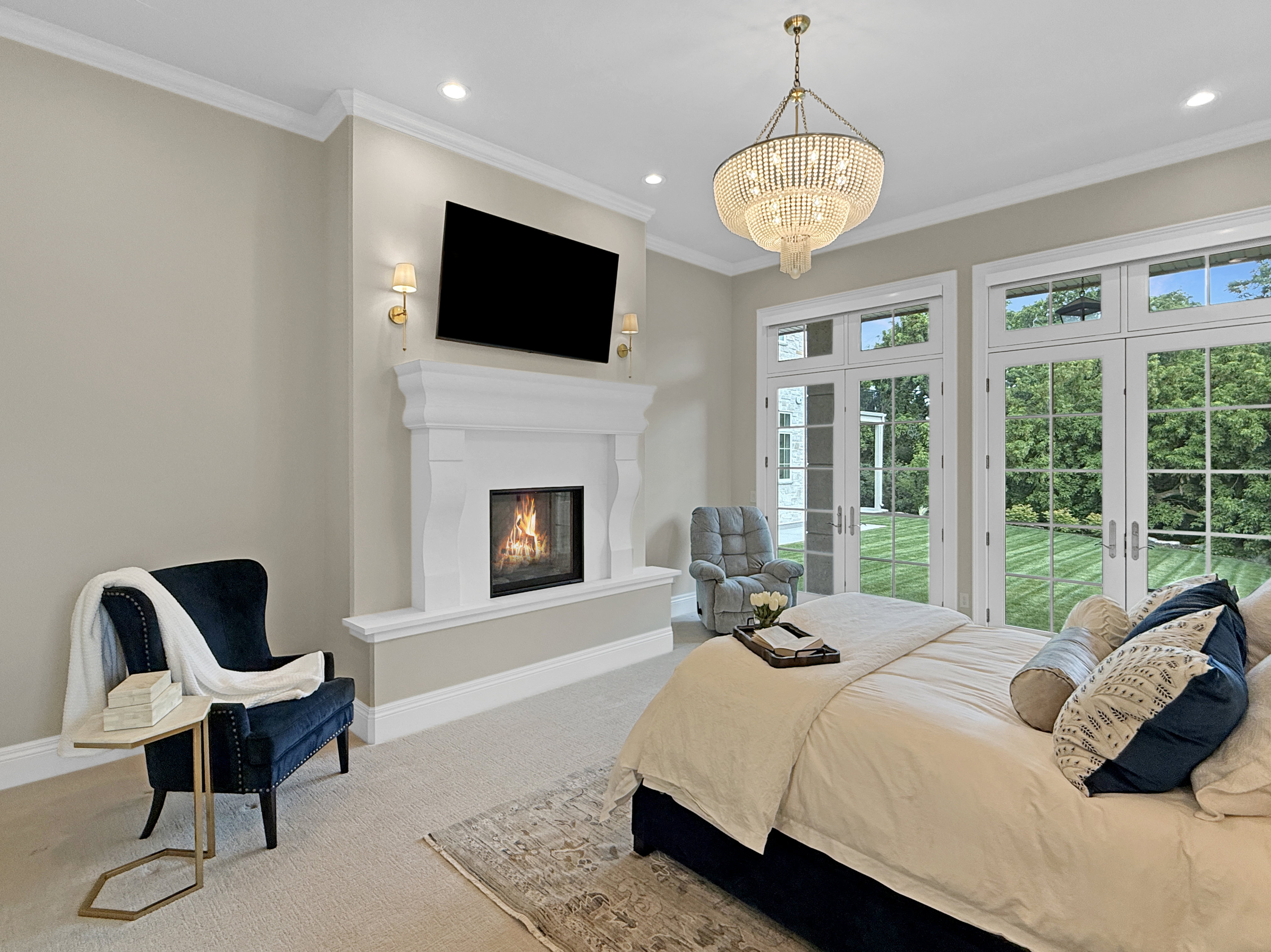 Carpeted bedroom featuring access to outside, multiple windows, recessed lighting, french doors, and ornamental molding