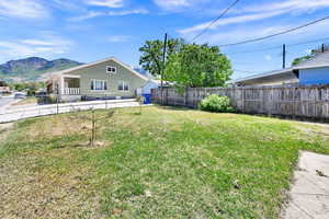 View of yard with a mountain view