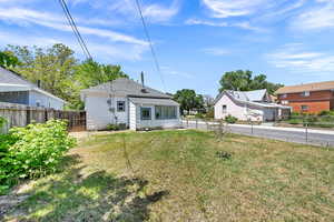 Back of property featuring central air condition unit